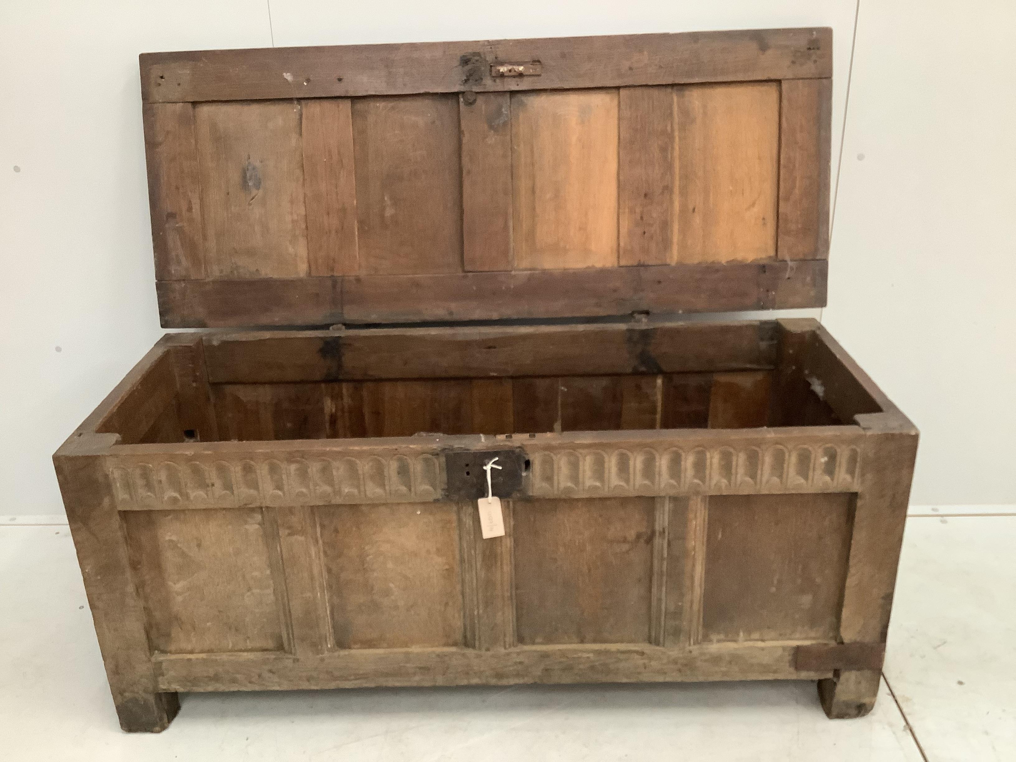 An 18th century and later oak coffer, width 143cm, depth 58cm, height 64cm